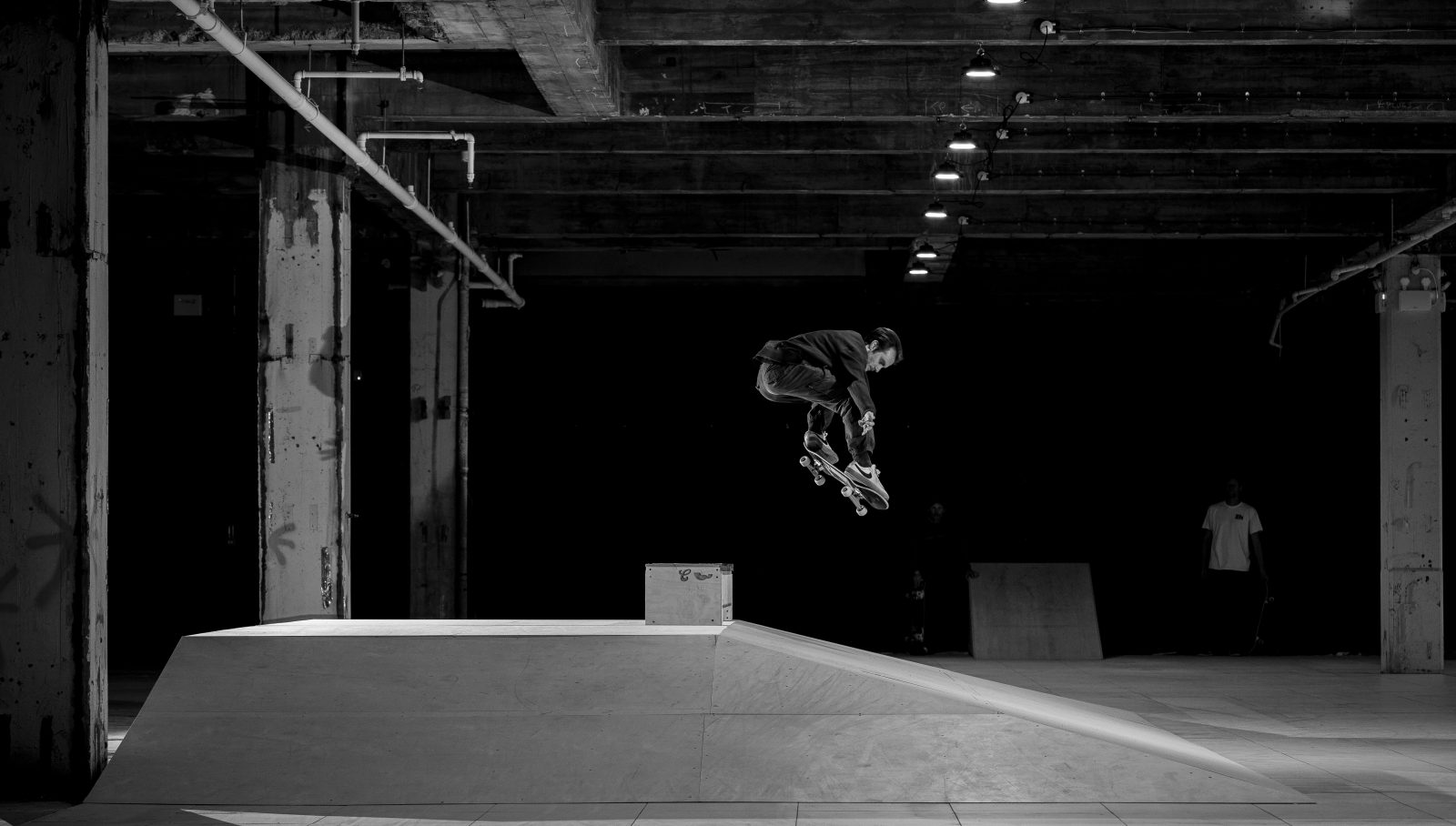 Black and white photo of man, mid-flight shredded in Shredenhams.